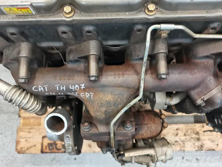 CAT TH 407 exhaust manifold CAT C4.4 Accert} Motory