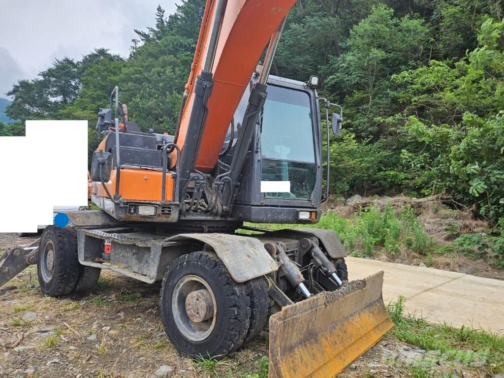 Doosan DX 210 W Kolová rýpadla