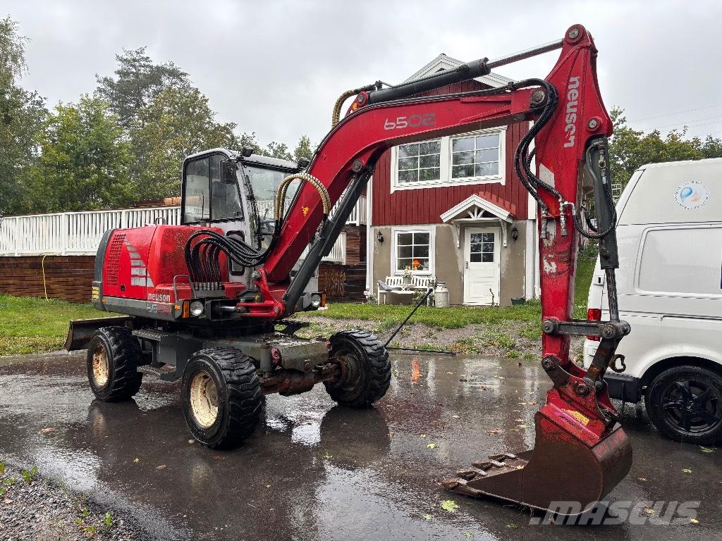 Neuson 6502 Kolová rýpadla