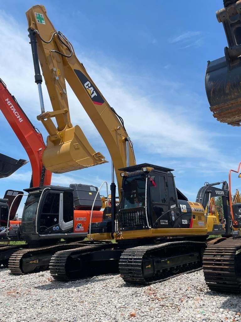CAT 323 Pásová rýpadla