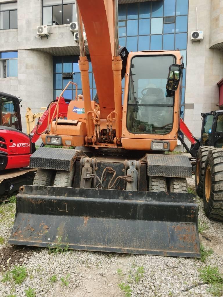 Doosan DH 210 W-7 Kolová rýpadla