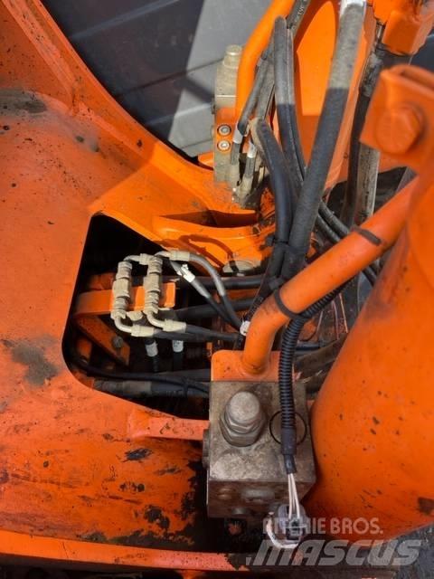 Doosan DX 140 LC Pásová rýpadla