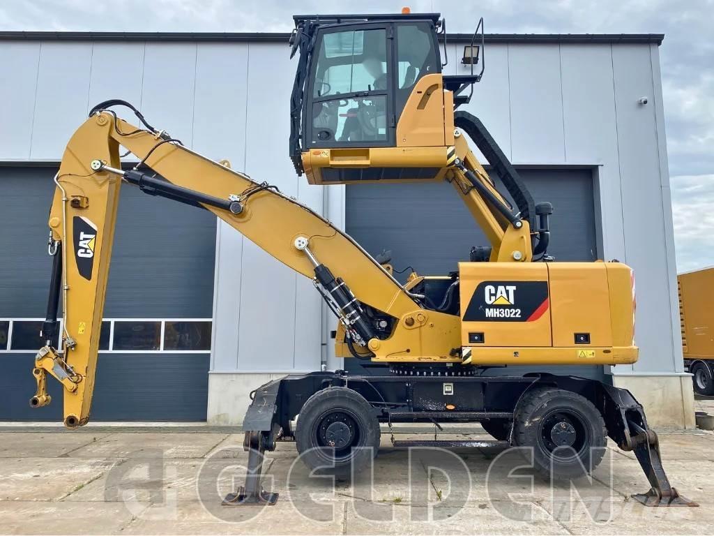 CAT MH3022 Stroje pro manipulaci s odpadem