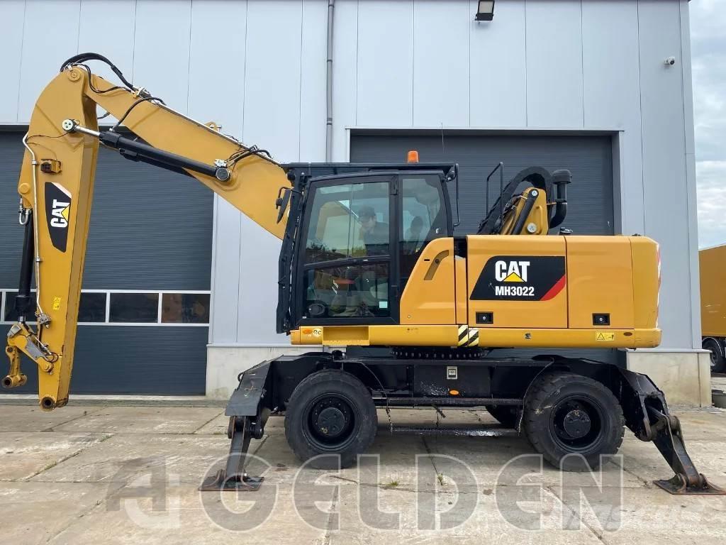CAT MH3022 Stroje pro manipulaci s odpadem