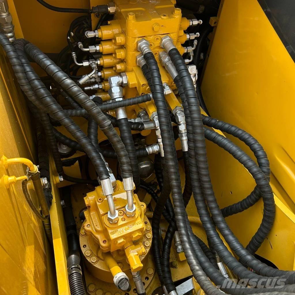 Komatsu 110 Pásová rýpadla