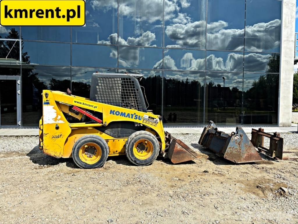Komatsu SK 815 Smykem řízené nakladače