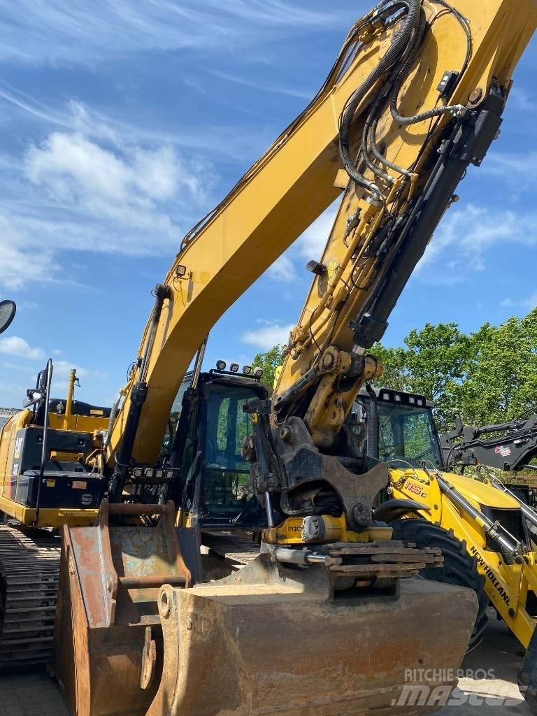CAT 323 EL Pásová rýpadla