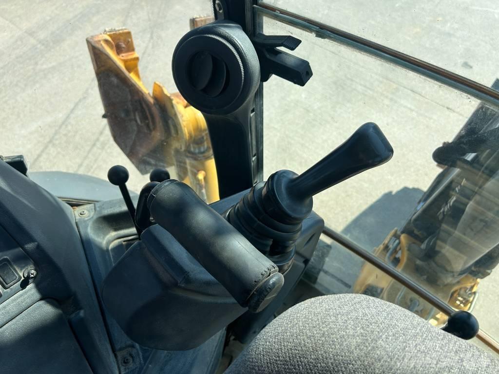 John Deere 310K Rýpadlo-nakladače