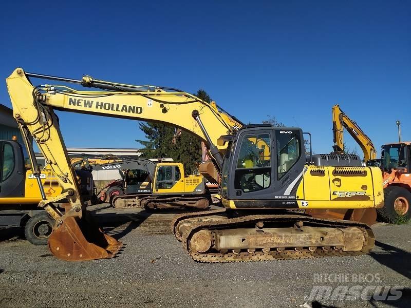 New Holland E 265 C Pásová rýpadla