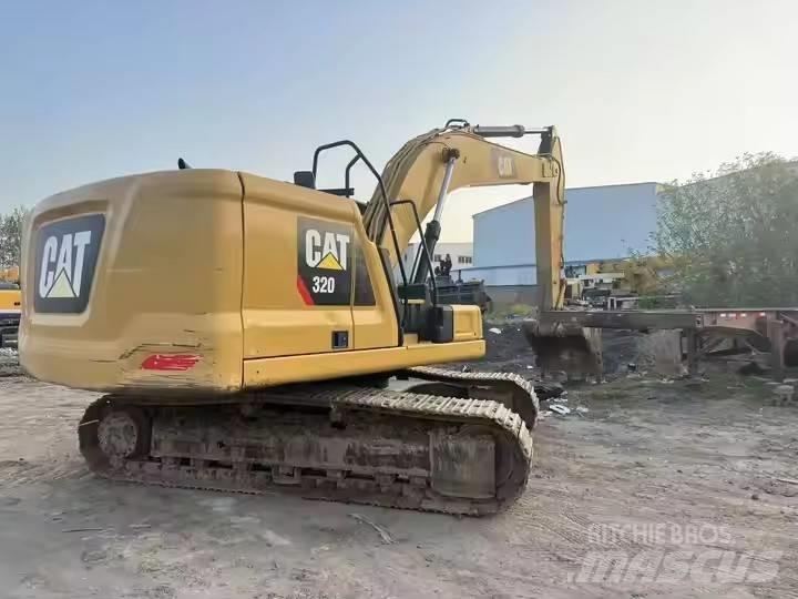 CAT CAT323GX Pásová rýpadla