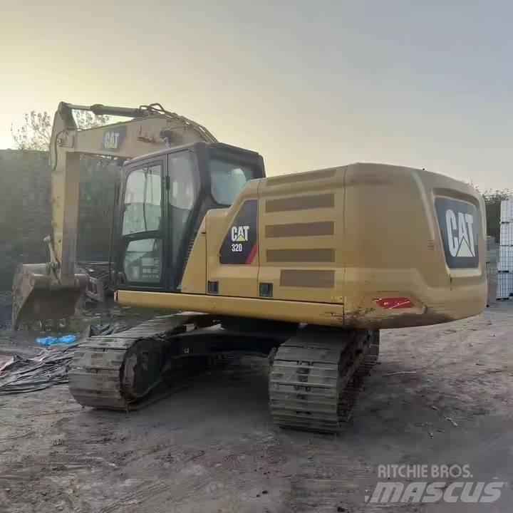 CAT CAT323GX Pásová rýpadla