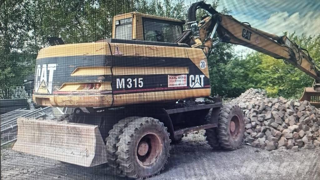 CAT M 315 Kolová rýpadla