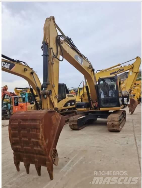 CAT 313 D Pásová rýpadla