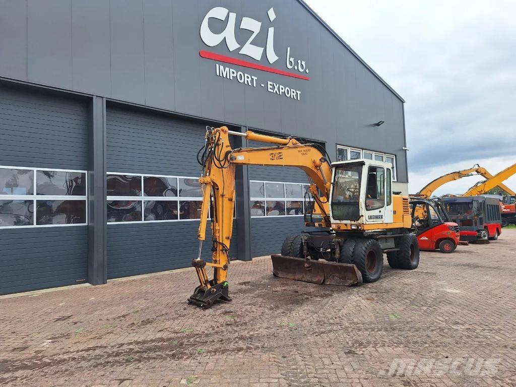 Liebherr A312 Kolová rýpadla