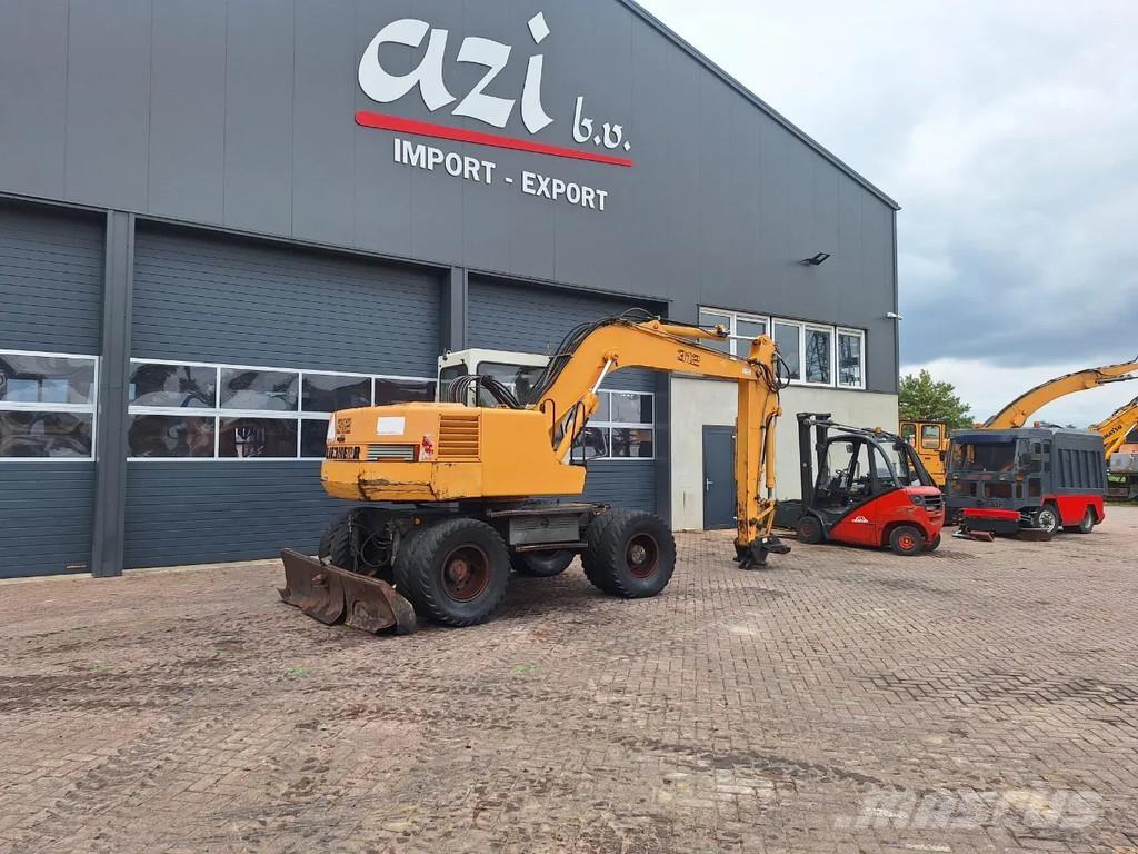 Liebherr A312 Kolová rýpadla