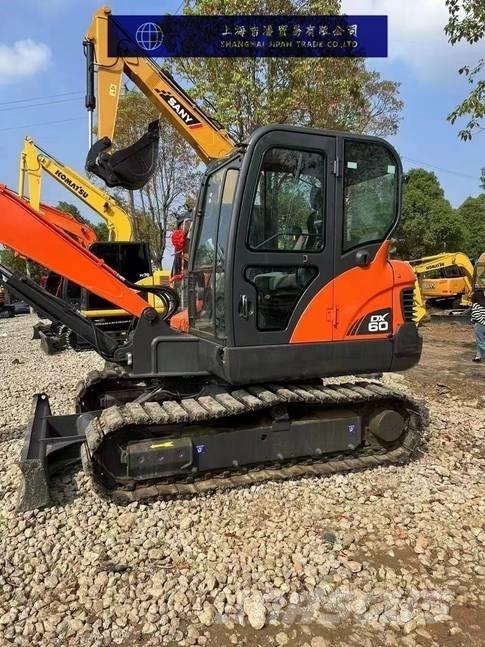 Doosan DX 60 Pásová rýpadla
