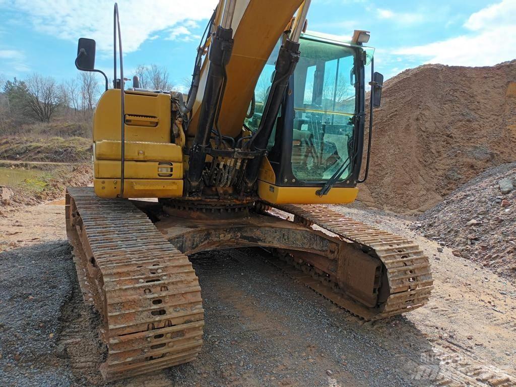 CAT 323 DL Pásová rýpadla
