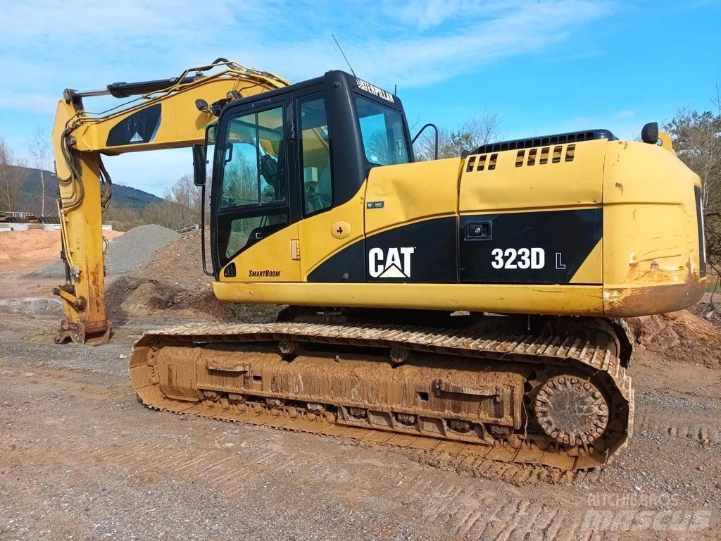 CAT 323 DL Pásová rýpadla
