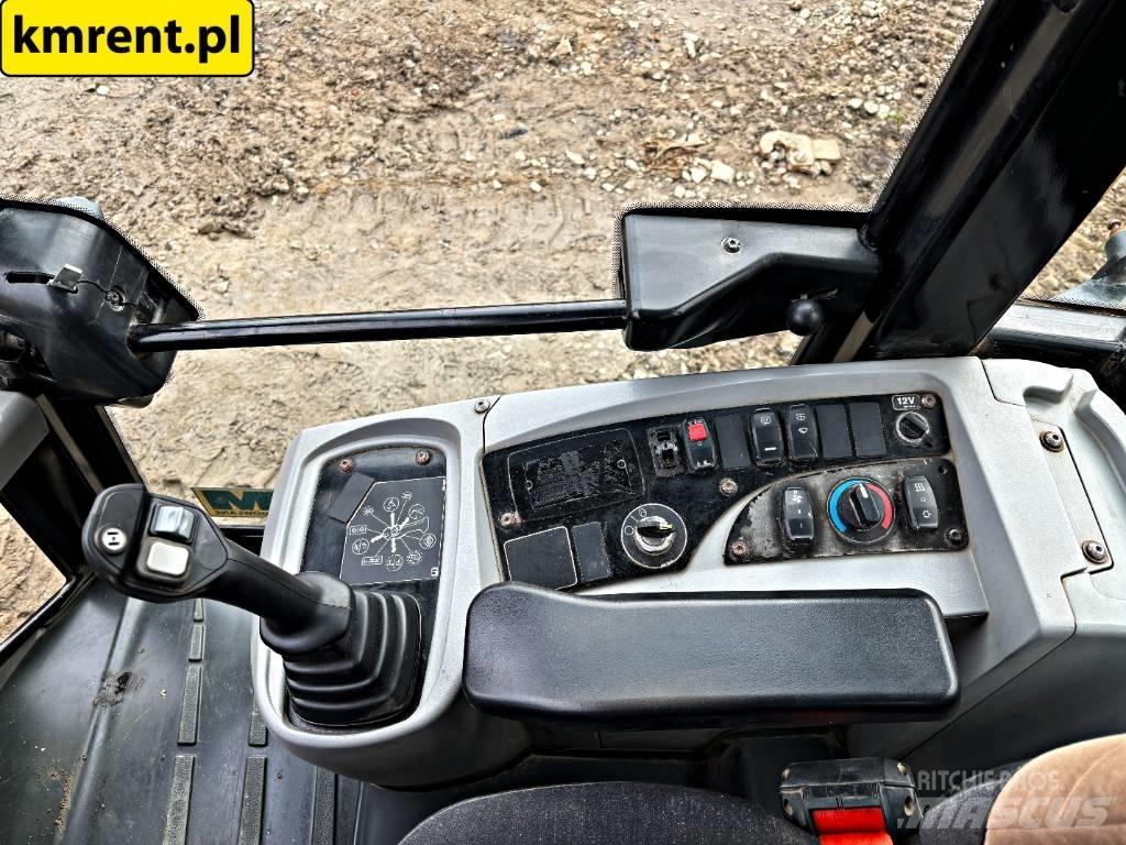 CAT 906 Kolové nakladače