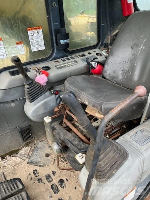 Komatsu PC 200 Pásová rýpadla