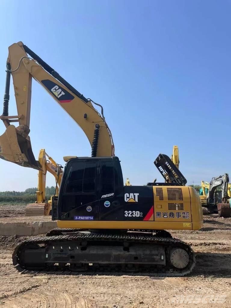 CAT 323 D Pásová rýpadla