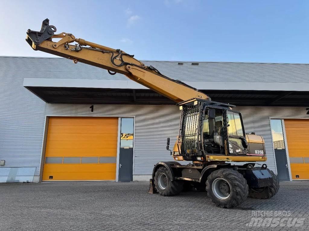 CAT M315C Kolová rýpadla