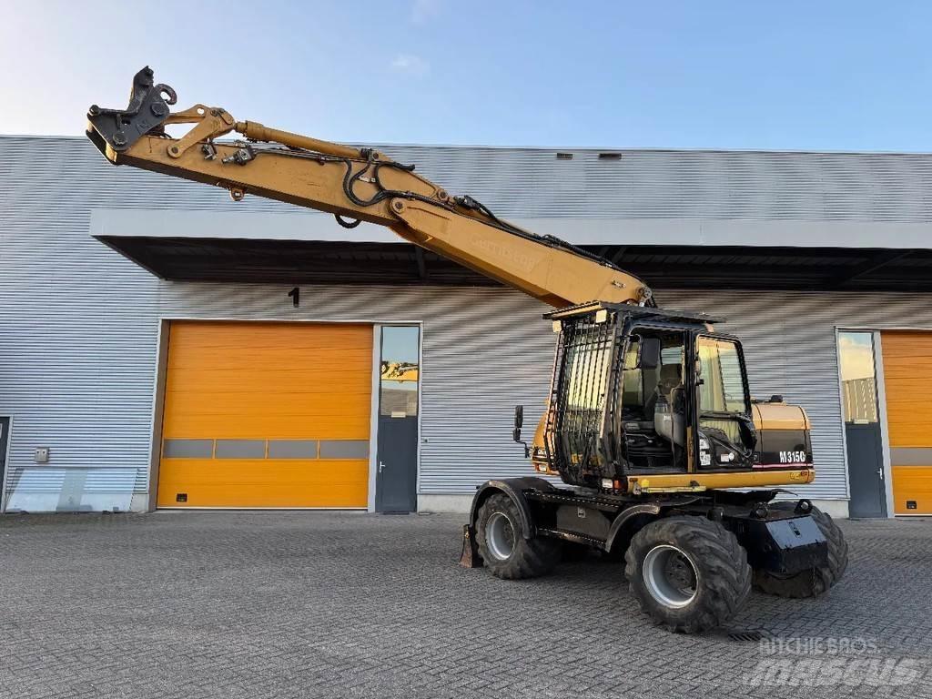 CAT M315C Kolová rýpadla