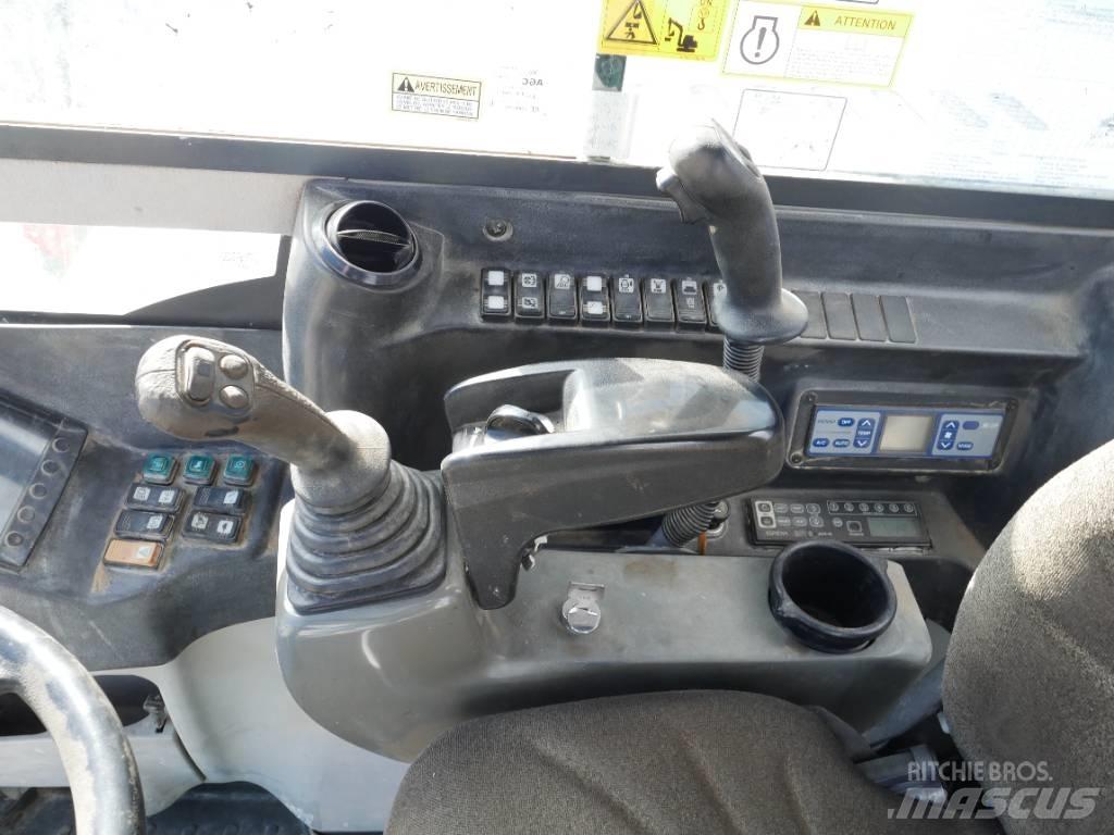 Takeuchi TB 295 W Kolová rýpadla