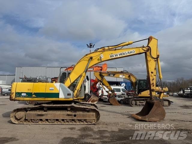 New Holland E 215 Pásová rýpadla
