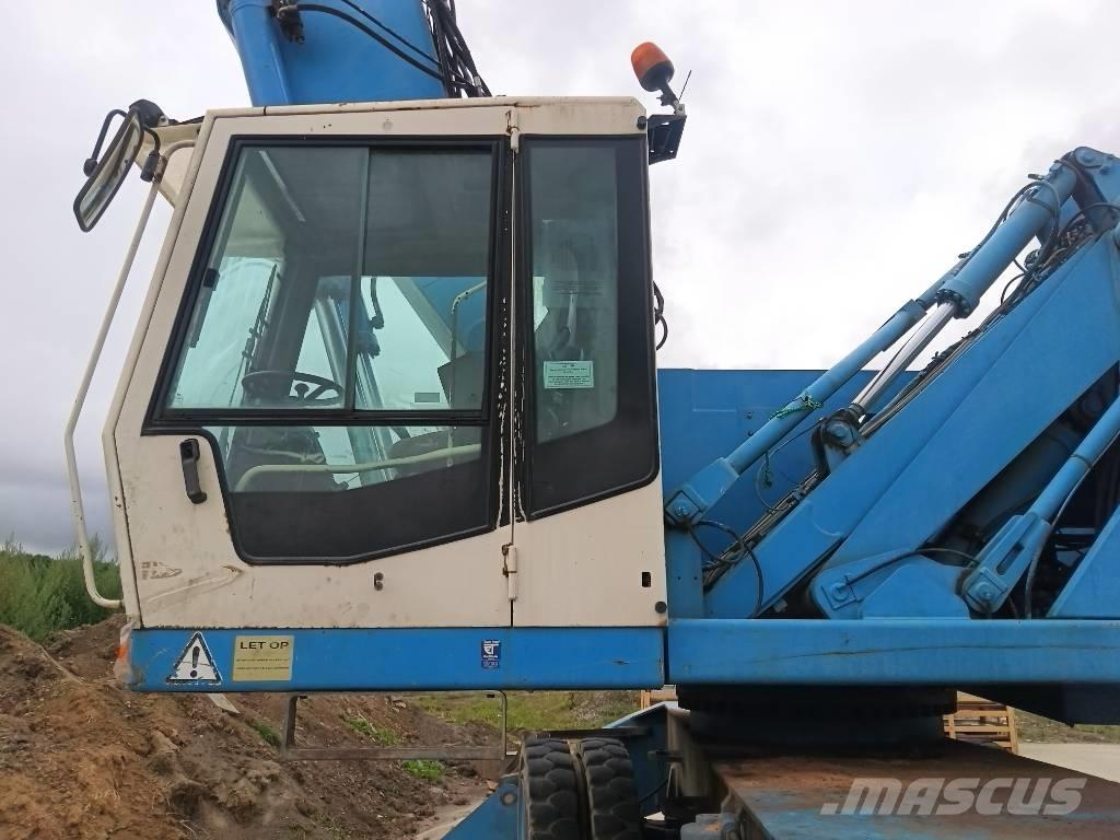 Fuchs MHL 360 Stroje pro manipulaci s odpadem