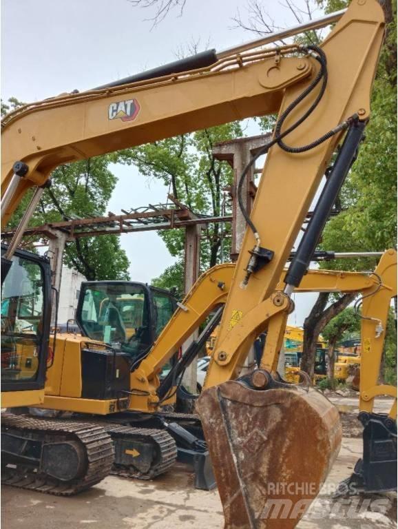 CAT 310 Pásová rýpadla