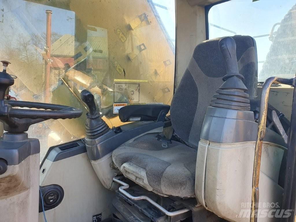 CAT M 325 C MH Stroje pro manipulaci s odpadem