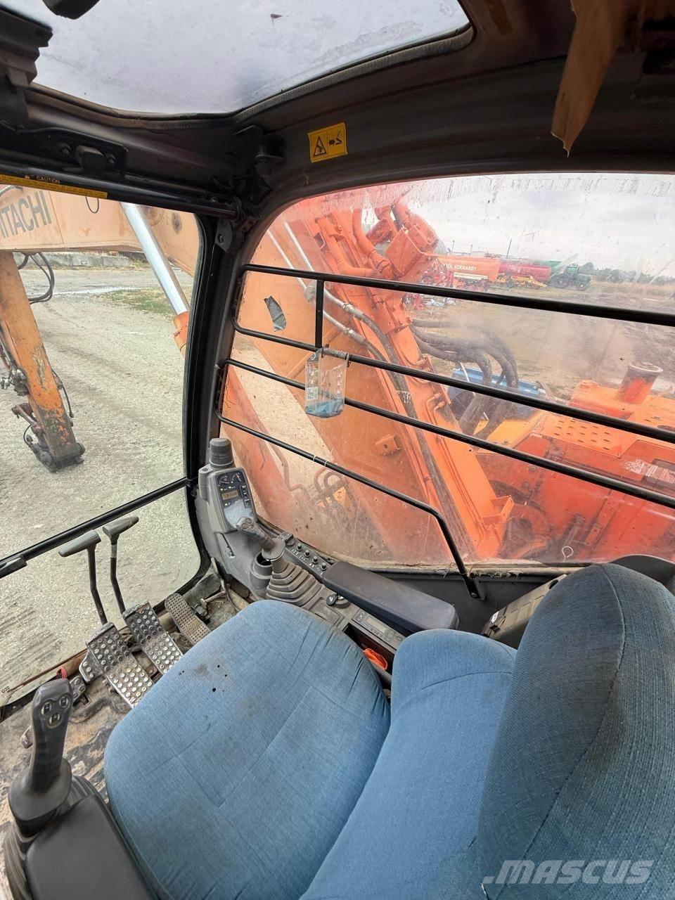 Hitachi ZX135US Pásová rýpadla