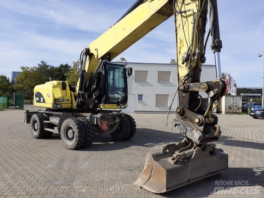 CAT M 322 D Kolová rýpadla