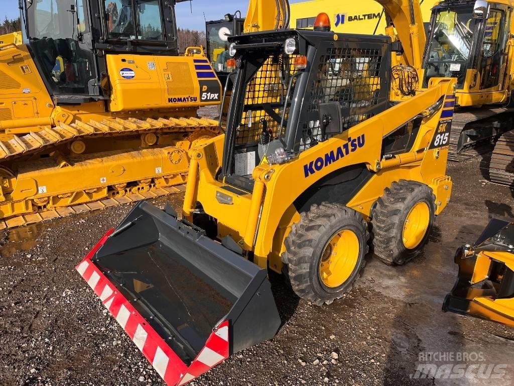 Komatsu SK815-8 Smykem řízené nakladače