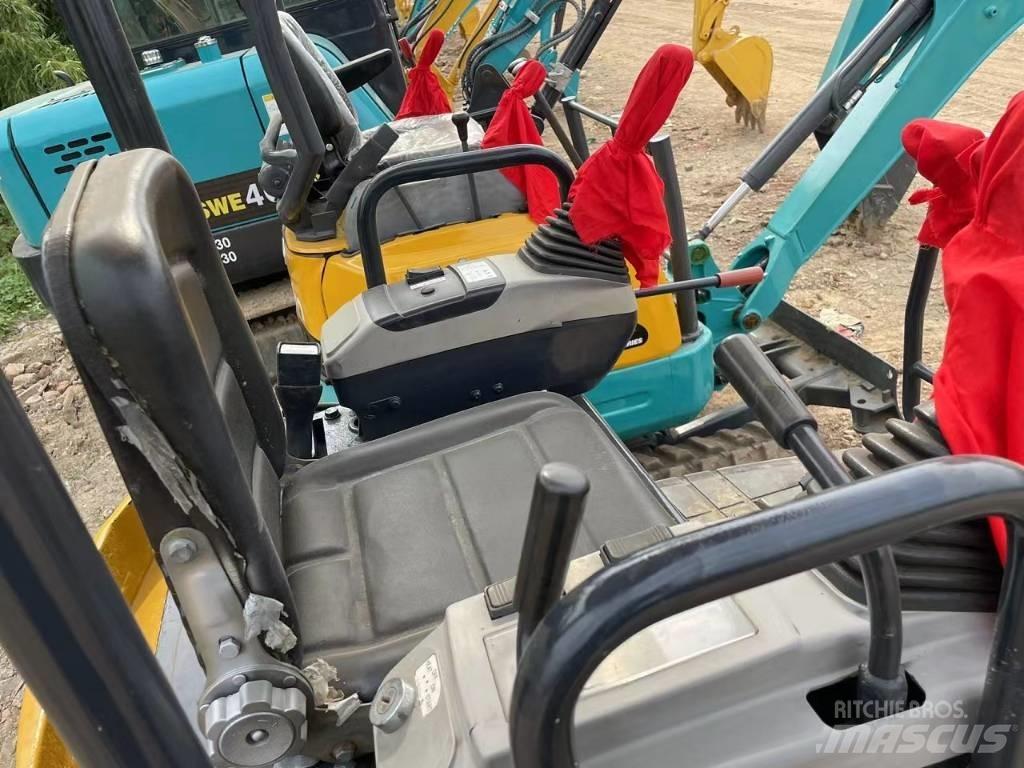Komatsu PC18 Pásová rýpadla
