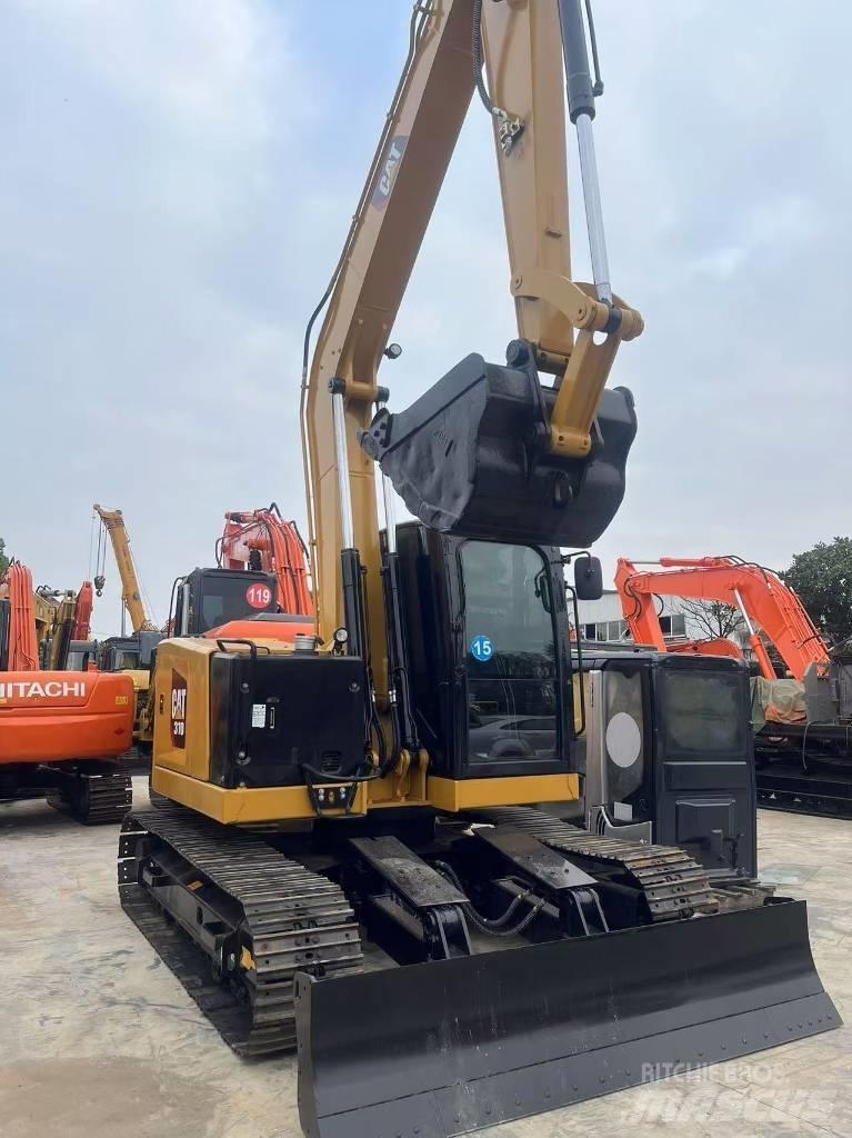 CAT 310 Pásová rýpadla