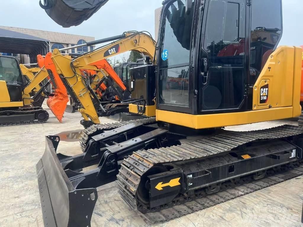 CAT 310 Pásová rýpadla