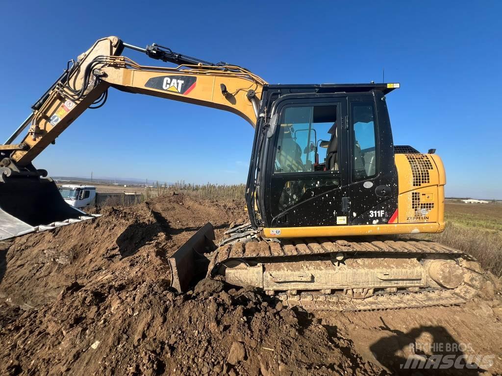 CAT 311 FL Pásová rýpadla