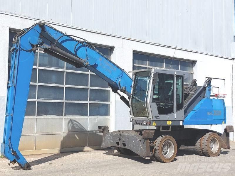 Fuchs MHL 320 D Stroje pro manipulaci s odpadem