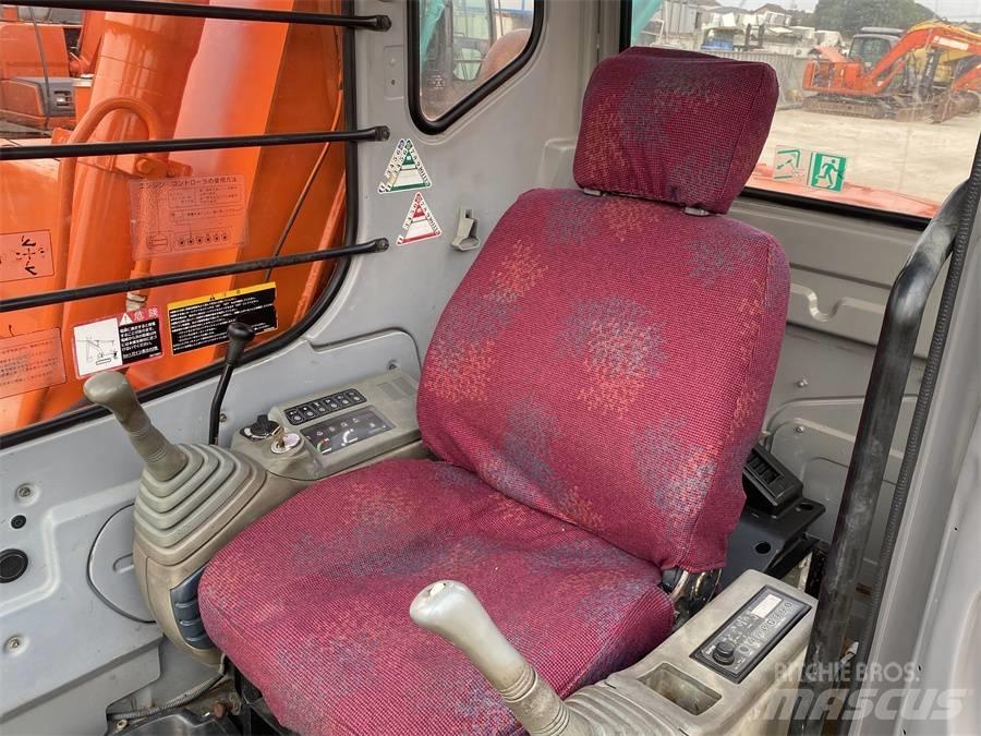 Hitachi EX60 Pásová rýpadla