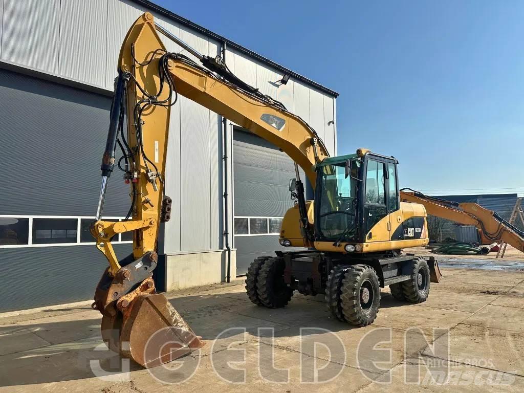 CAT M313D Kolová rýpadla