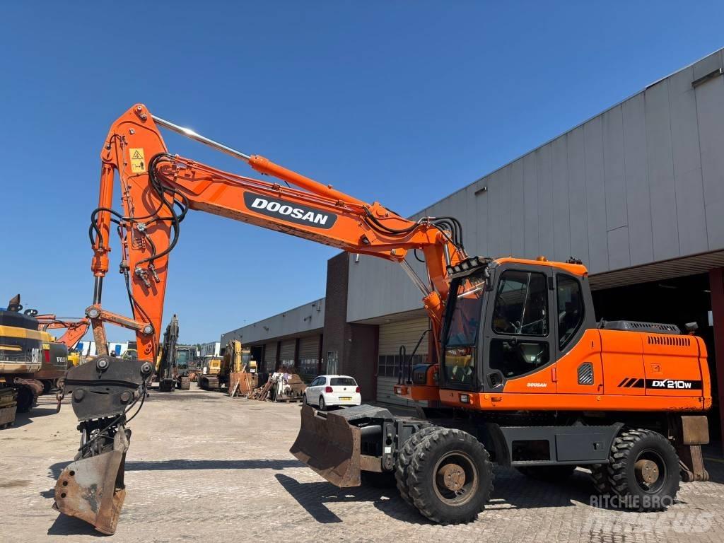 Doosan DX 210 W Kolová rýpadla