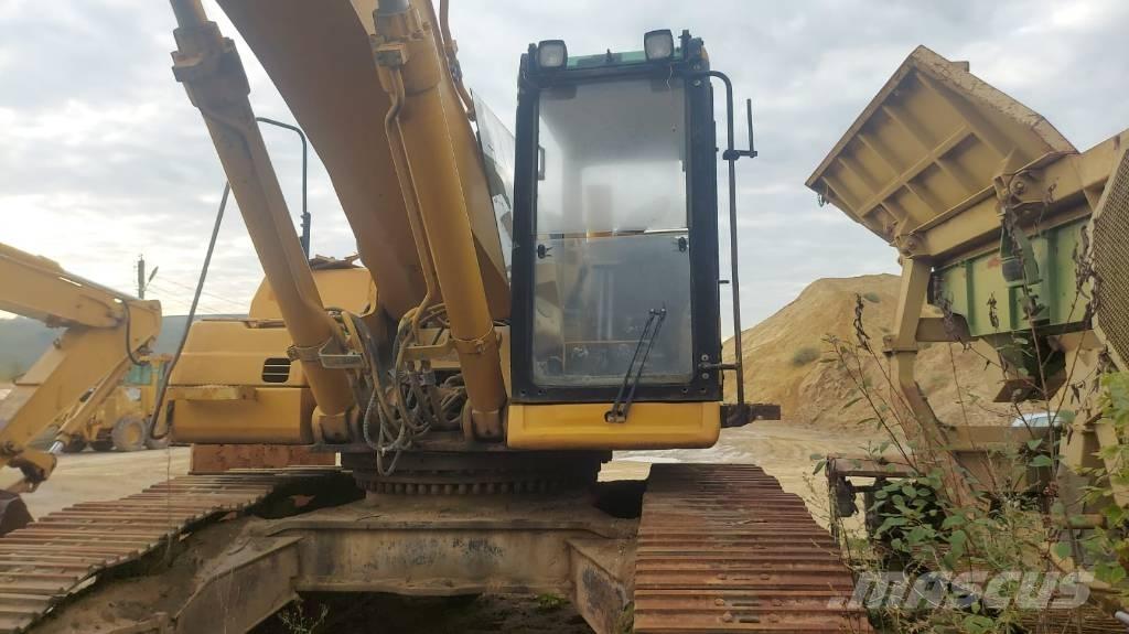 CAT 345 B L Pásy, řetězy a podvozek