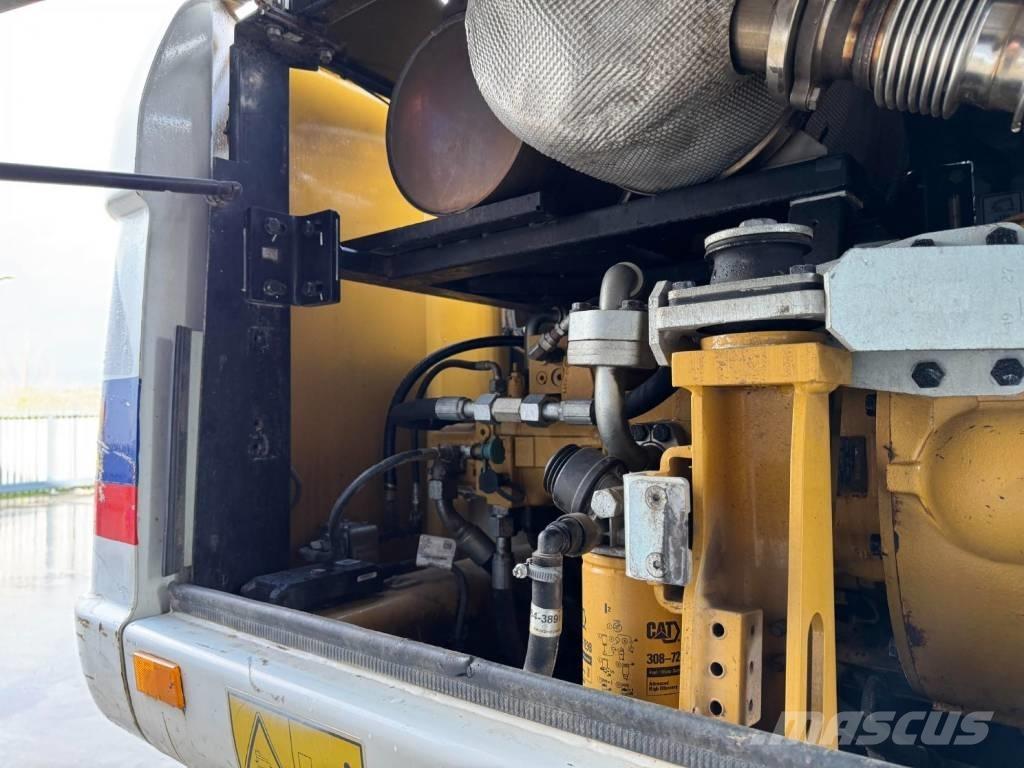 CAT M315D Kolová rýpadla