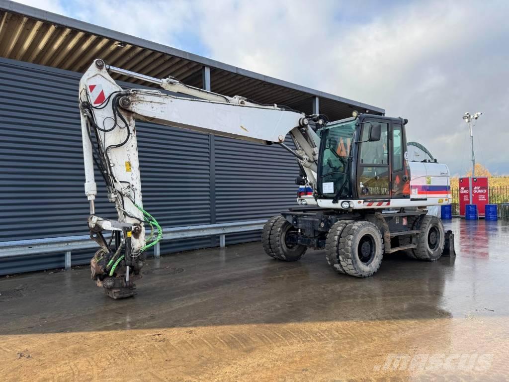 CAT M315D Kolová rýpadla