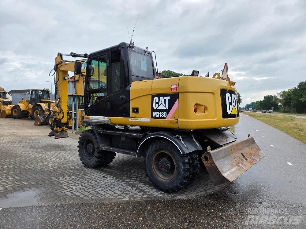 CAT M313D Kolová rýpadla