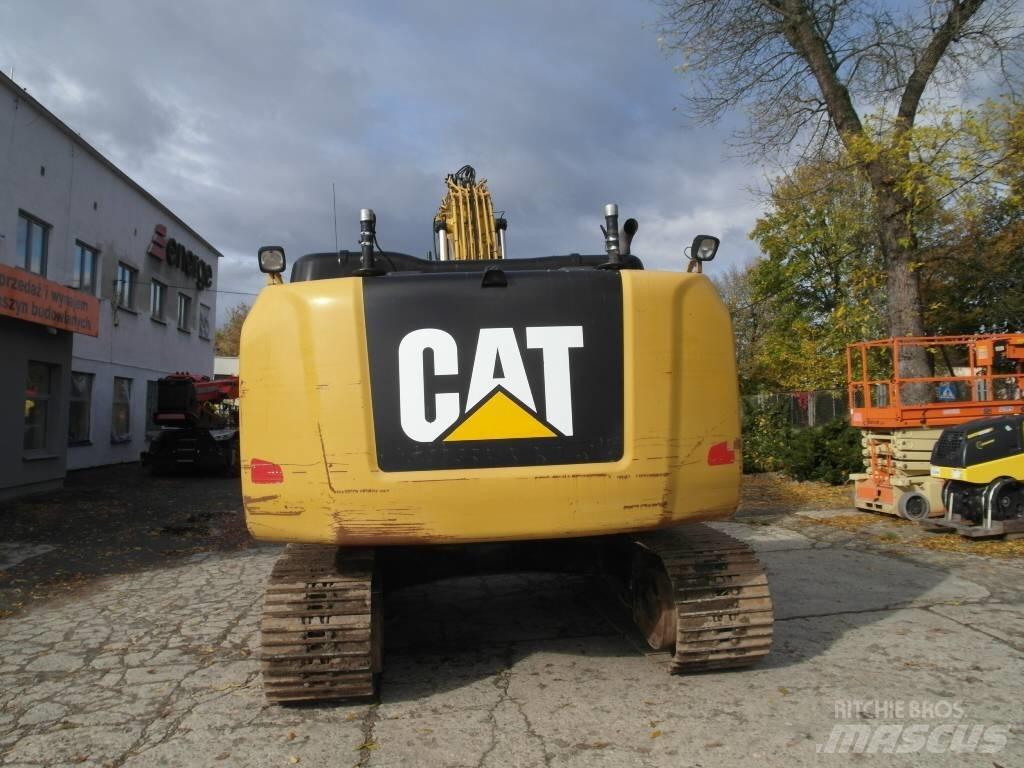 CAT 323 EL Pásová rýpadla