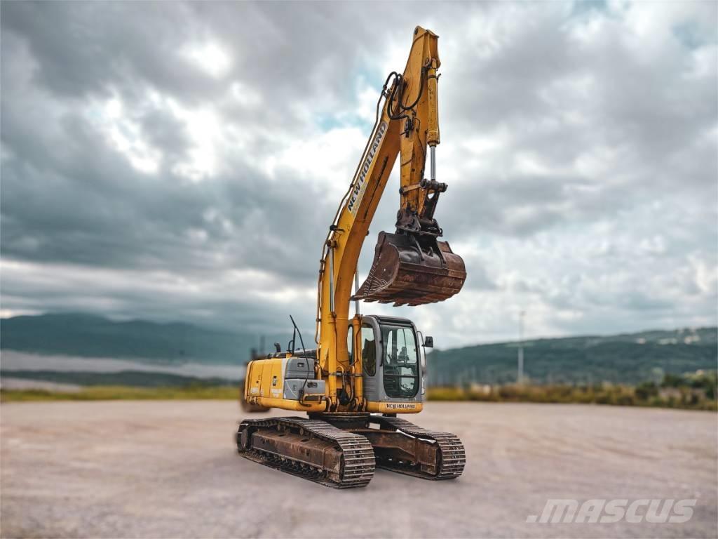 New Holland E 245 B Pásová rýpadla