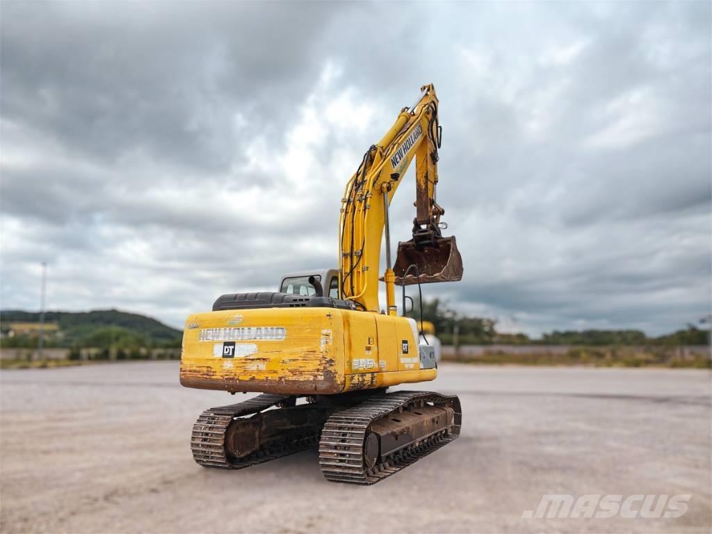 New Holland E 245 B Pásová rýpadla